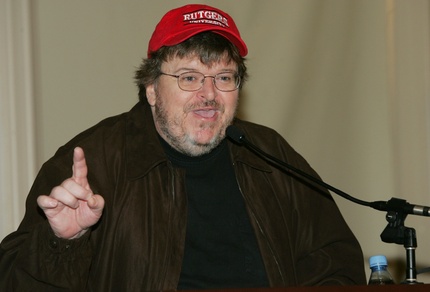 Michael Moore Signs Copies of Fahrenheit 911 Book and DVD